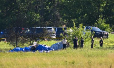 Investigators look for cause of skying plane crash that killed 12