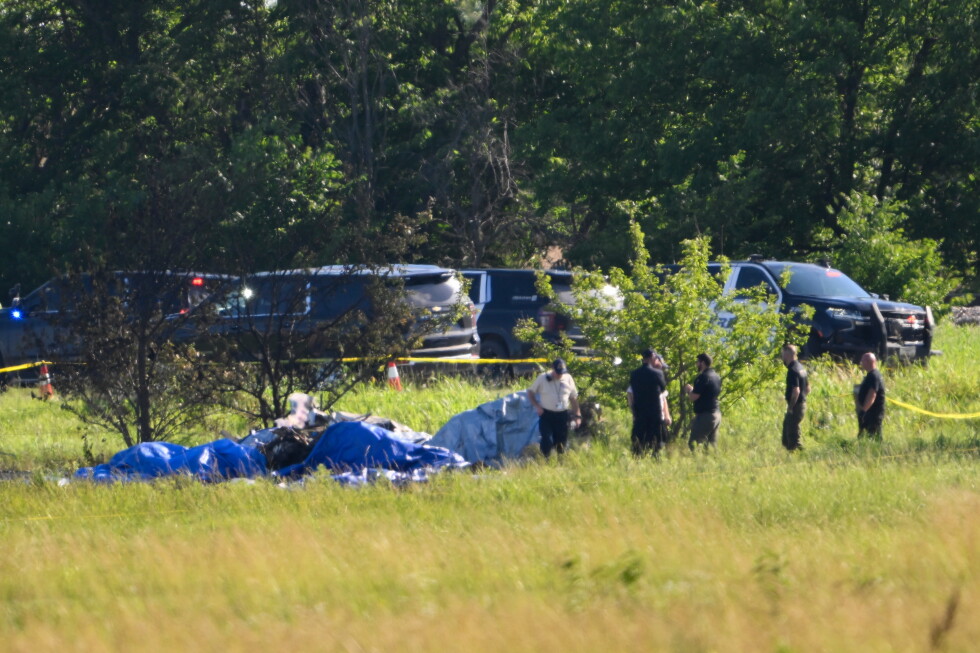 Investigators look for cause of skying plane crash that killed 12