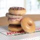 A variety of doughnuts from Krispy Kreme are pictured.