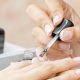 woman gets a manicure (close up shot of hands)