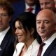 Meta CEO Mark Zuckerberg stands in a crowd next to amazon Chairman Jeff Bezos and Google CEO Sundar Pichai.