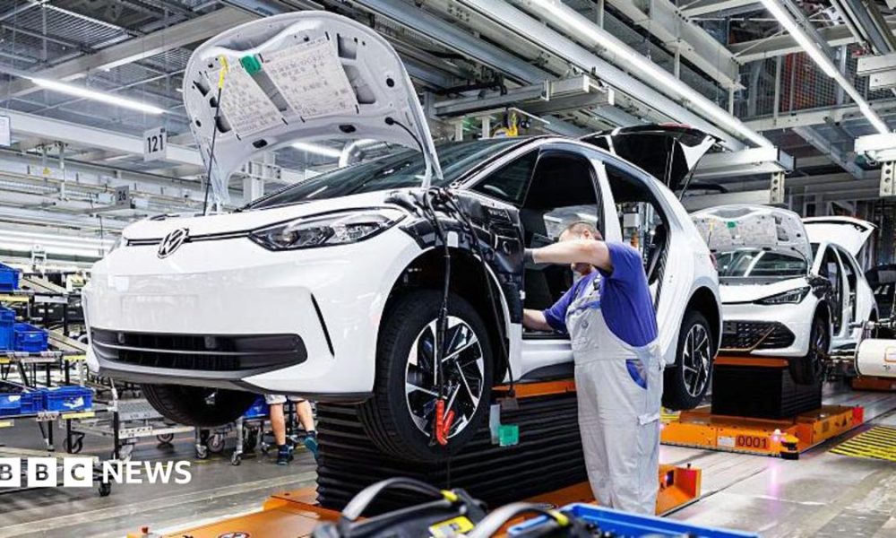 Man working on a VW production line