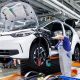 Man working on a VW production line