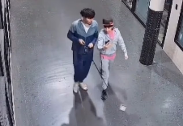 One of the pair can be seen holding a fishing rod with money on the end, while the other films