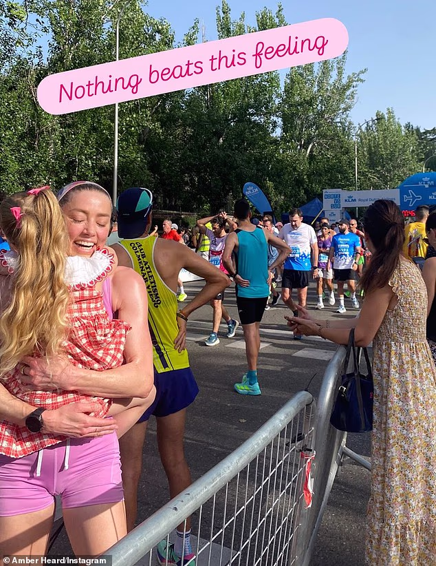 Inside Amber Heard low-key life in Madrid as she ditches dating to focus on raising her children (pictured with eldest daughter Oonagh at the KLM Norte Sur 10K race in Madrid on June 21)