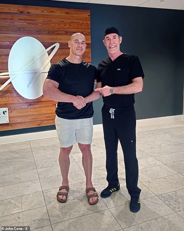 John Cena showed off his bald head with Dr. Ken Anderson after starting the second round of his hair transplant surgery this week