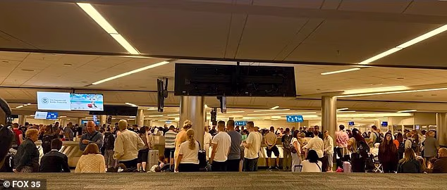 Massive crowds were seen at Orlando International Airport (MCO) on Saturday night as passengers were forced to wait for hours to get through customs and claim their luggage