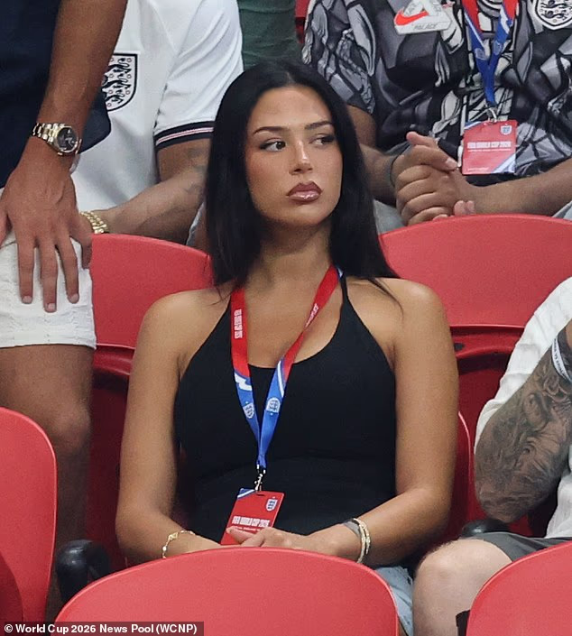 Jude Bellingham's girlfriend Ashlyn Castro dressed to impress in a black halterneck top as she took her seat in the Atlanta Stadium ahead of England's World Cup clash against DR Congo