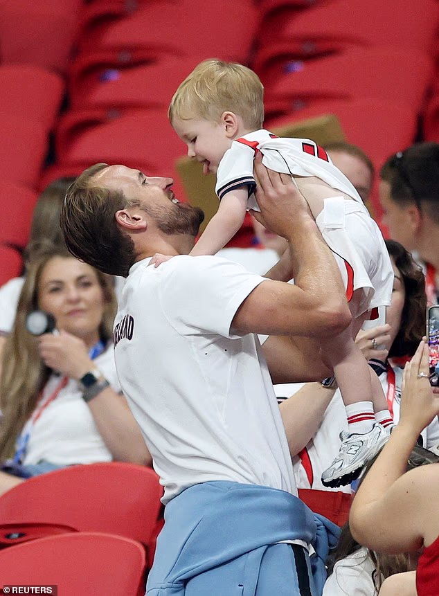 Harry Kane lifted his two-year-old son aloft and beamed as he gazed into his eyes after securing victory for England