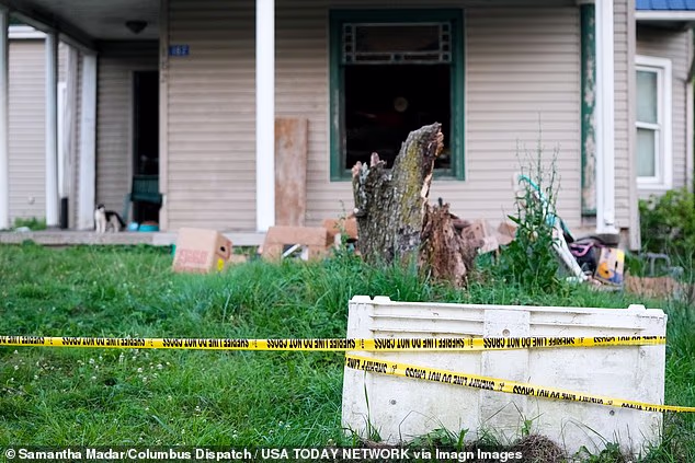 Sixteen children who 'looked like feral animals' were rescued from this tiny dilapidated home in Hamden, Ohio