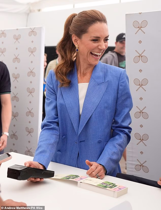 The Princess of Wales helps out in the ticket office on day four of the Championships