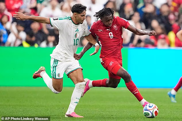 The 20-year-old Swiss star Johan Manzambi (right) again impressed for his country