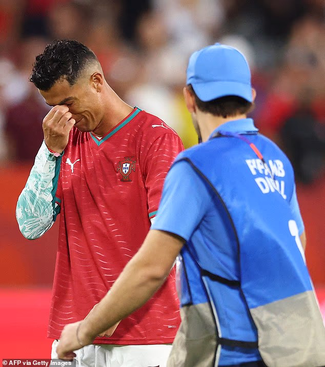 Cristiano Ronaldo was in tears on the pitch - wearing a Diogo Jota shirt - at the World Cup