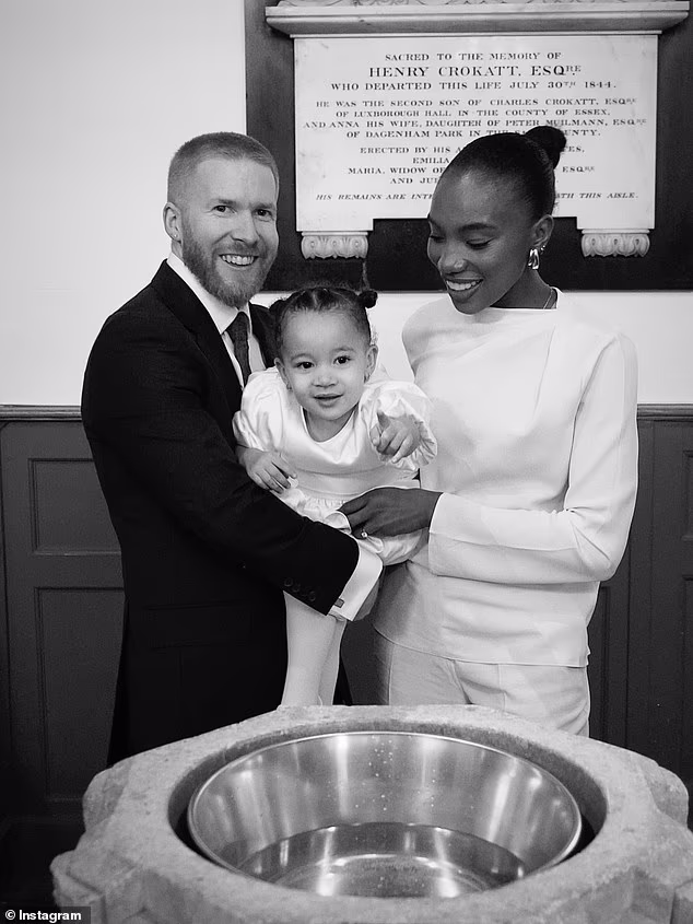 Strictly's Neil Jones and Chyna Mills tied the knot in London on Wednesday after dancer 'banned his family from attending over racism row' (pictured at their daughter's christening last year)