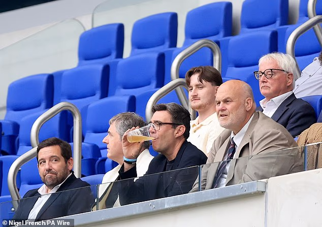 Andy Burnham raised the prospect of the football alcohol ban being overturned in a video posted from a rugby league match at the Hill Dickinson Stadium