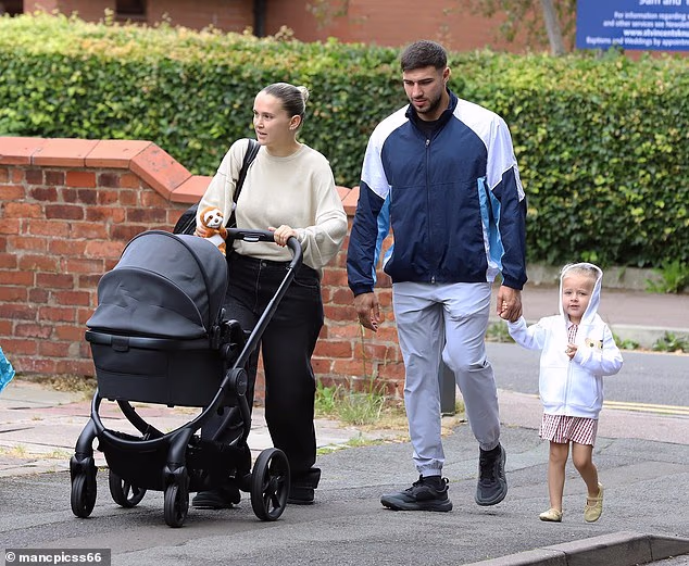 Molly Mae Hague and her boyfriend Tommy Fury stepped out in Cheshire on Saturday with their daughter Bambi, three, and newborn son Midas