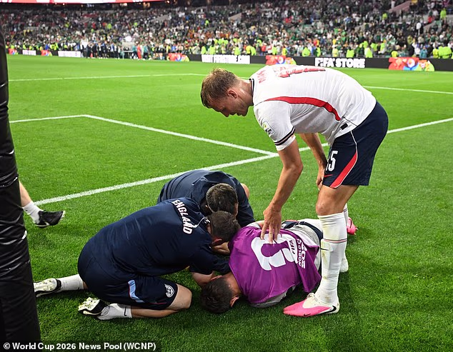 Jordan Henderson (in purple) was taken off the pitch on a stretcher at the Azteca after England's win