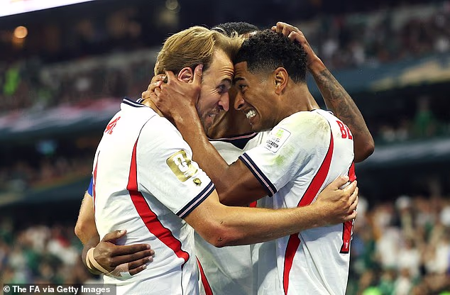 Harry Kane and Jude Bellingham celebrate after Bellingham's second goal against Mexico during the last-16 clash at the Azteca stadium on Sunday night