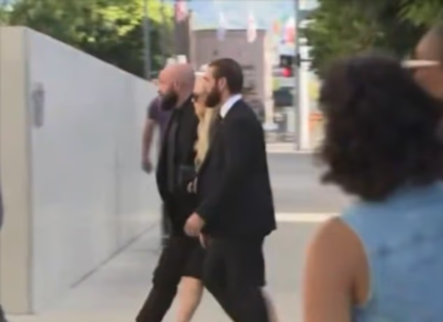 Erika Kirk is seen walking into the Utah court house Monday morning where she faced her husband's alleged killer for the first time