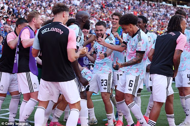 Belgium's Romelu Lukaku and his team-mates celebrate with a 'Trump dance', mocking the US president
