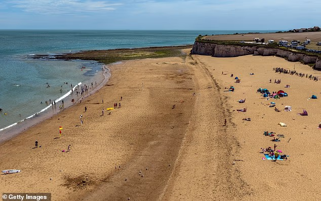Broadstairs beach's idyllic-looking golden sands today as temperatures began to build