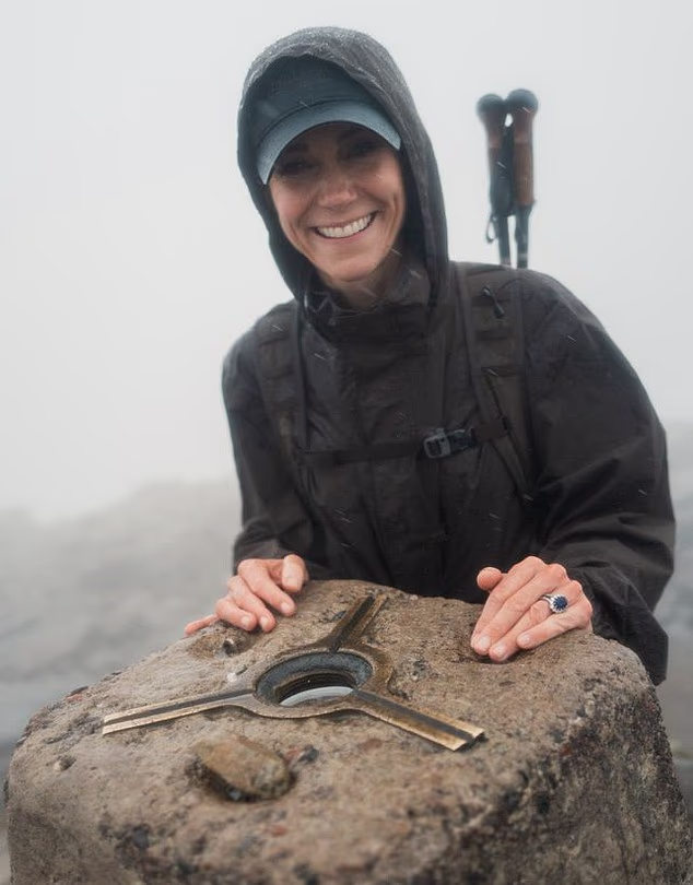 A smiling Kate at the top of Ben Nevis