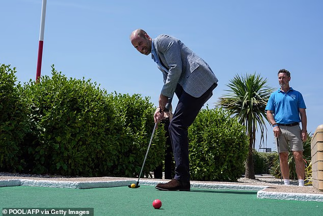 The Prince of Wales soared to the top of a celebrity leaderboard at a Hastings seafront crazy golf course, after taking on the famous windmill hole