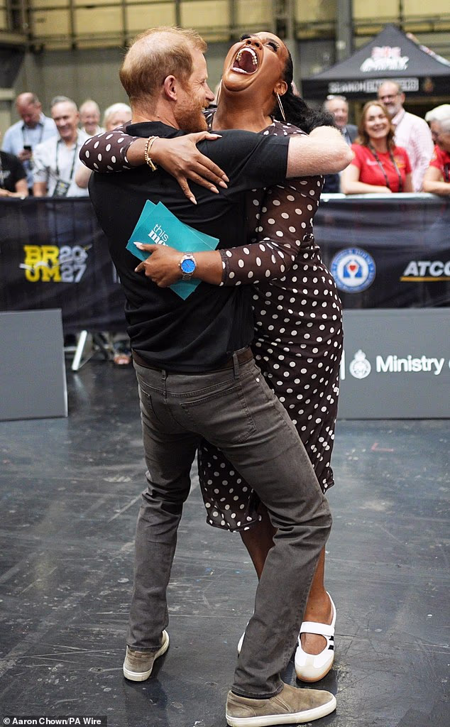 Prince Harry hugs Alison Hammond and tells her he 'loves his family' on live TV as Meghan prepares to bring Archie and Lilbet to join him in the UK for possible reunion with the King