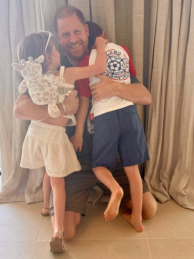 Prince Harry pictured with his children Archie and Lilibet in a Fathers Day post. The children met their Royal grandparents on Friday for the first time since 2022