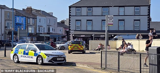 Cleveland Police at Seaton Carew Beach in County Durham, where two men died trying to rescue children in the water