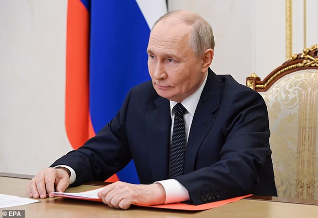 Russian President Vladimir Putin chairs a meeting with members of the Security Council via videoconference at the Kremlin in Moscow, Russia, July 10