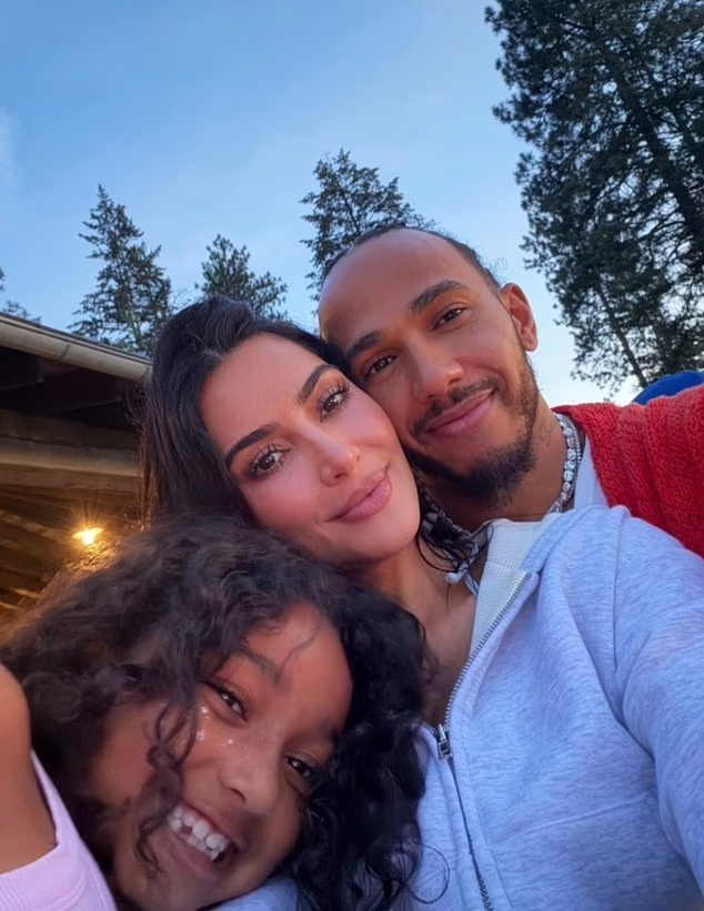 Kim Kardashian and Lewis Hamilton took a major step in their relationship as he joined her children and famed family for a scenic lake holiday