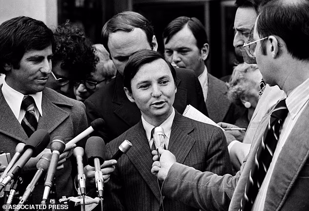 Donald Segretti is surrounded by newsmen outside the U.S. District court in Washington, October 2, 1973, after pleading guilty to three charges of violating federal election laws during the 1972 Democratic presidential primary