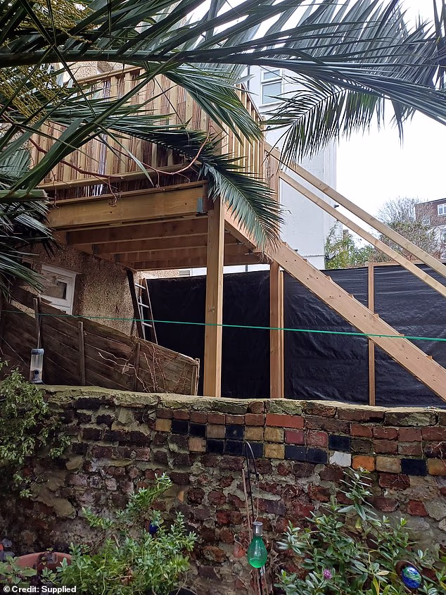 The 65-year-old woman has been left furious after Brighton and Hove Council granted her neighbours retrospective planning permission for replacement stairs and a new platform