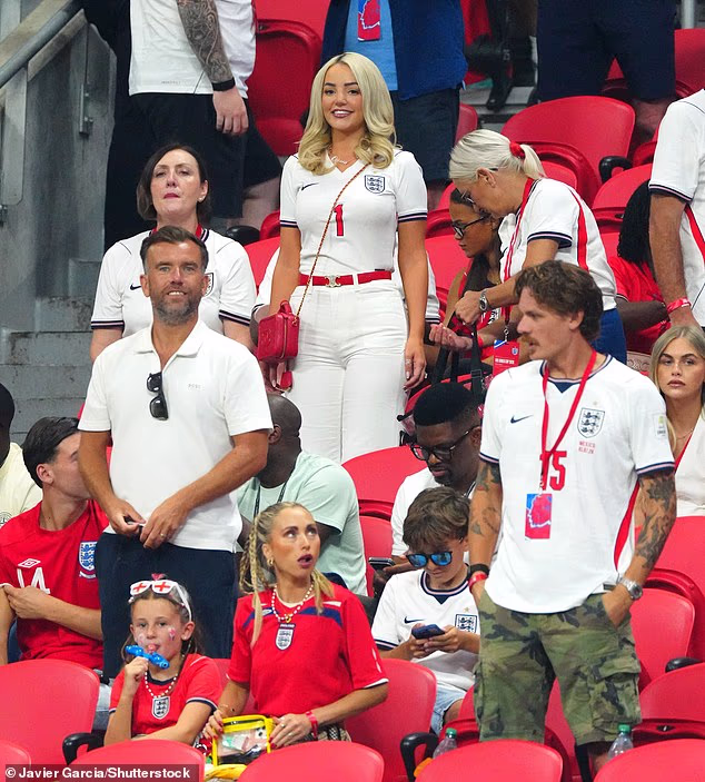 Jordan Pickford's wife Megan (pictured) and Jude Bellingham's girlfriend Ashlyn Castro were seen in the stands as they led the WAGs rooting for England ahead of the World Cup semi-finals on Wednesday night