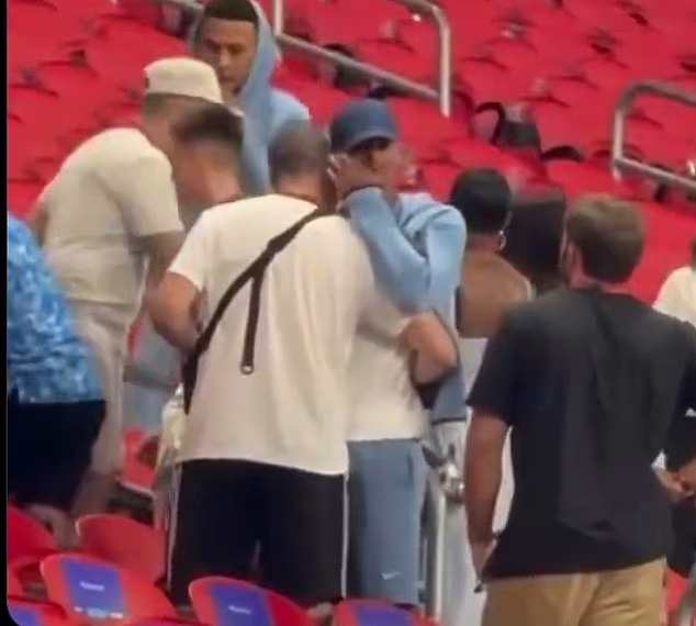 Footage showed the Real Madrid star embracing his father, Mark Bellingham, while wiping away tears
