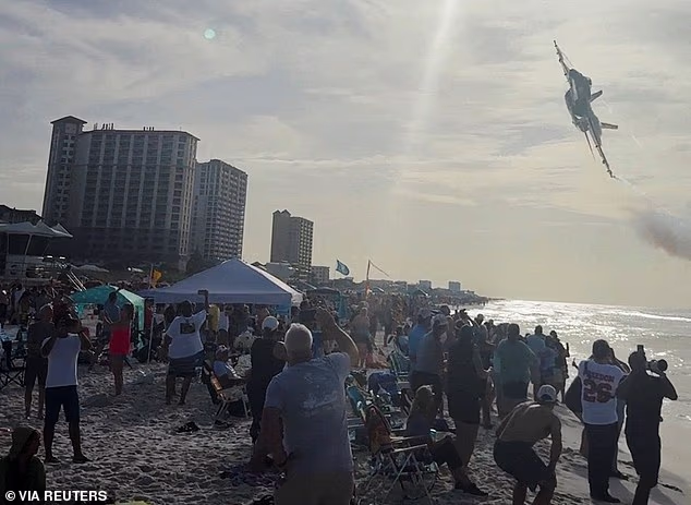 The U.S. Navy¿s elite Blue Angels demonstration squadron has launched a safety review after one of its fighter jets flew unusually low over packed Florida beaches