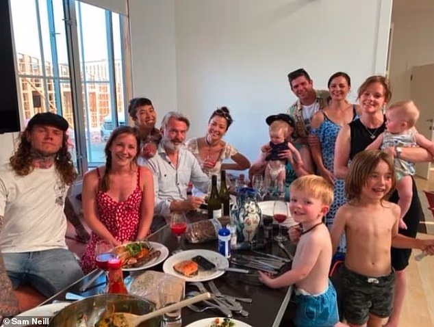 Sam Neill was one of the world's most recognisable actors, but away from the cameras his greatest pride was his family (Sam is pictured with members of his family, including daughter Elena Neill and step daughter Maiko)