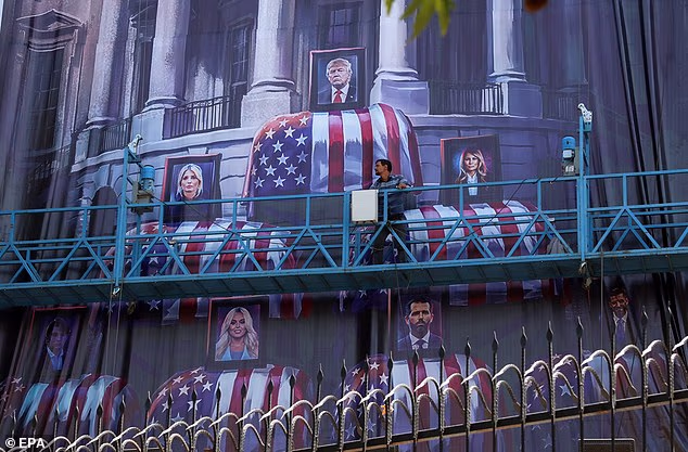 Tehran unveiled a billboard depicting US President Donald Trump and members of his family above coffins draped in the American flag on Thursday