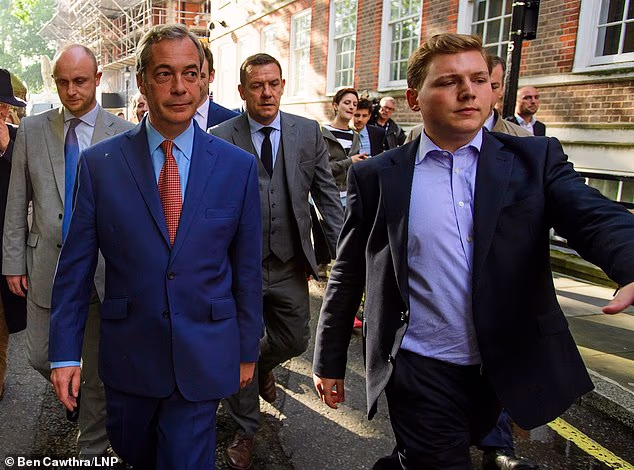 George Cottrell (right), pictured with Nigel Farage (left) on the day the UK voted to leave the EU, has a penthouse apartment overlooking the swanky Porto Montenegro resort