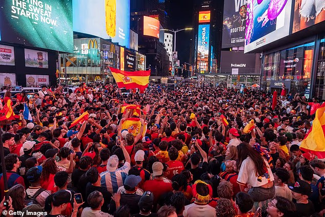 Times Square was full of Spain World Cup fans into the early hours of Monday morning