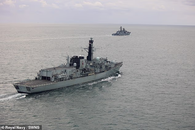 HMS Iron Duke shadows RFN Neustrashimy and cargo ship Sparta (file pic)