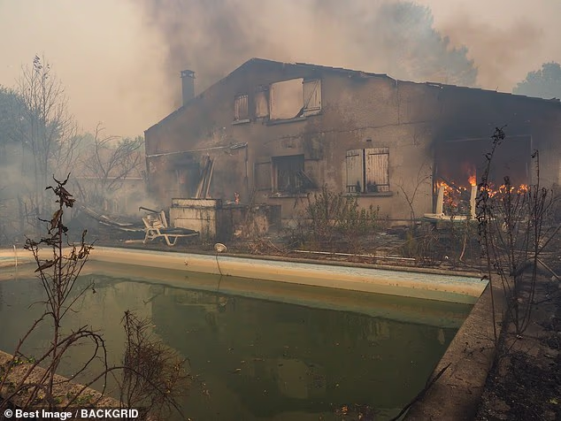 Pictured: The remains of a property in Lège-Cap-Ferret after a fire tore through the outskirts of the French commune