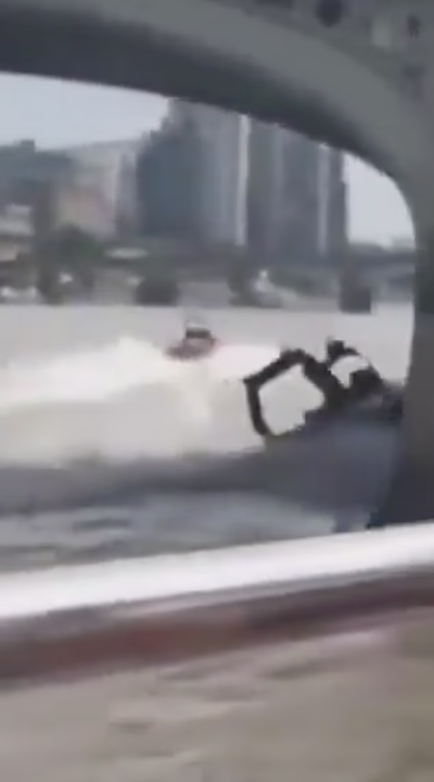 This is the moment a police boat collided into Westminster Bridge sending officers flying into the River Thames as five are 'seriously injured'