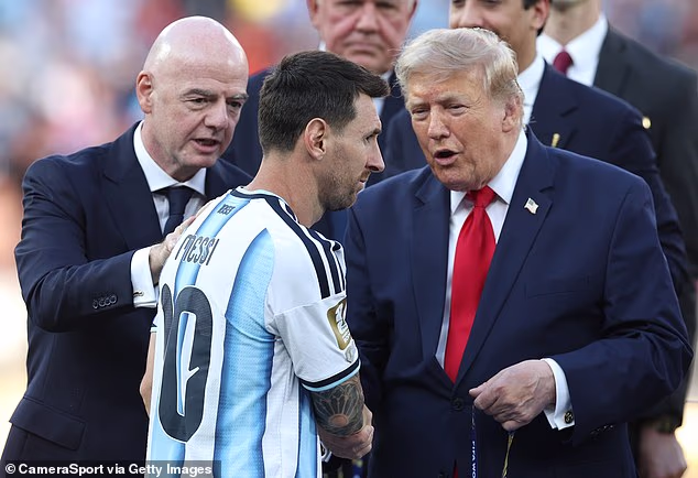 Gianni Infantino handed Lionel Messi his silver medal alongside President Trump