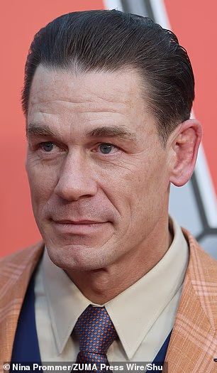 17-time WWE world champ John Cena shared details about undergoing his second FUE (Follicular Unit Extraction) hair transplant nearly two years after the 'life-changing' first round (pictured in August 2024 before the surgery)