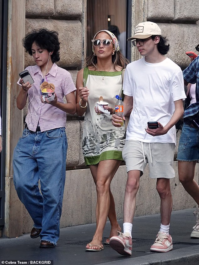Jennifer Lopez enjoys a family trip to Rome with her children Oskar (left) and Max on Monday, as she prepares to become an empty nester