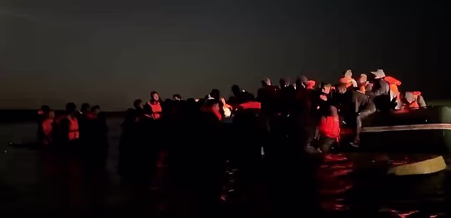 Barely 24 hours after Mr Burnham made his startling claim, video evidence shows the French authorities doing nothing to prevent a packed boat leaving the beach for Britain