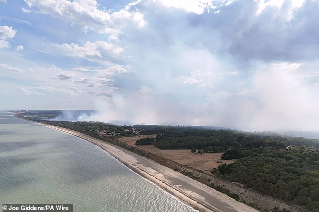 Suffolk Fire and Rescue Service said the blaze at Dunwich Heath, Suffolk covered around 24 acres, but today this had increased to the size of 210 football pitches