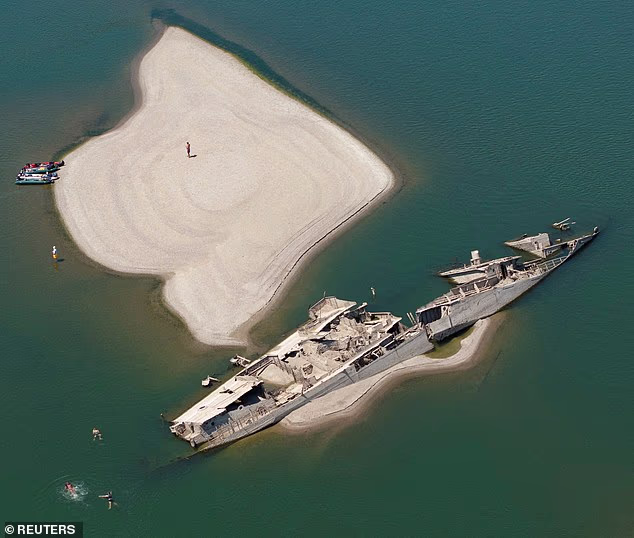 A Second World War German warship has been uncovered in the Danube River due to record-low water levels